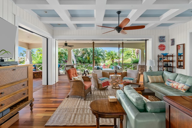 living room with hardwood / wood-style flooring, coffered ceiling, a wealth of natural light, and ceiling fan