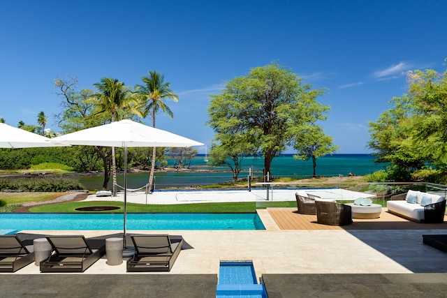 view of swimming pool featuring a water view and an outdoor hangout area