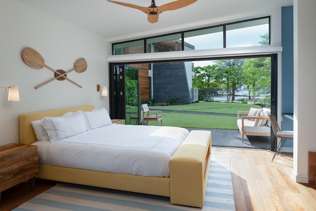 bedroom featuring ceiling fan and wood-type flooring