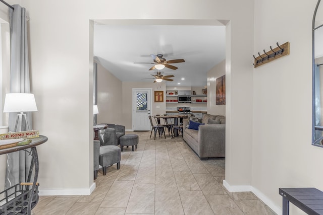 living room featuring ceiling fan