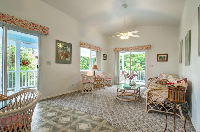 living room with lofted ceiling, parquet flooring, and ceiling fan