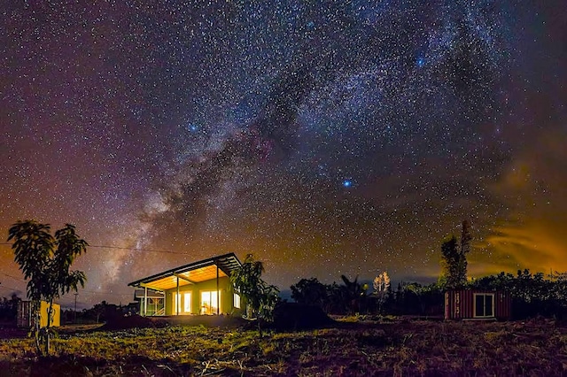 view of property exterior at twilight