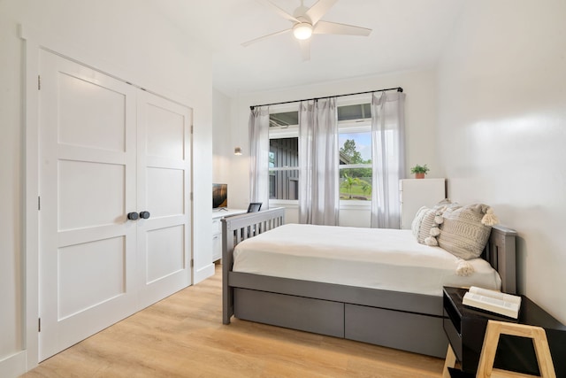 bedroom featuring ceiling fan and light hardwood / wood-style flooring