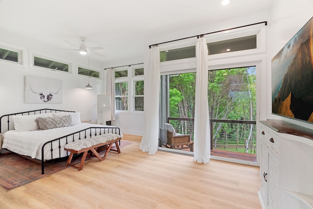 bedroom featuring ceiling fan and light hardwood / wood-style flooring