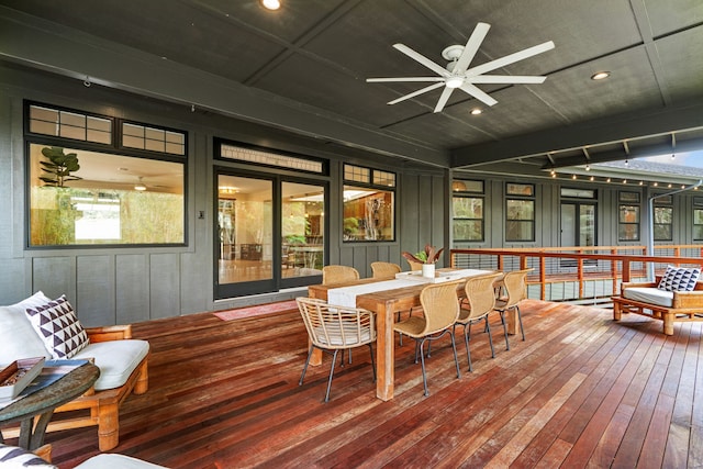 sunroom / solarium with ceiling fan