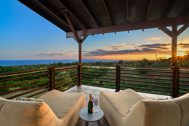 balcony at dusk with a water view