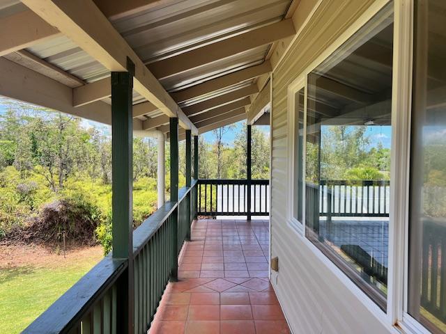 unfurnished sunroom with lofted ceiling