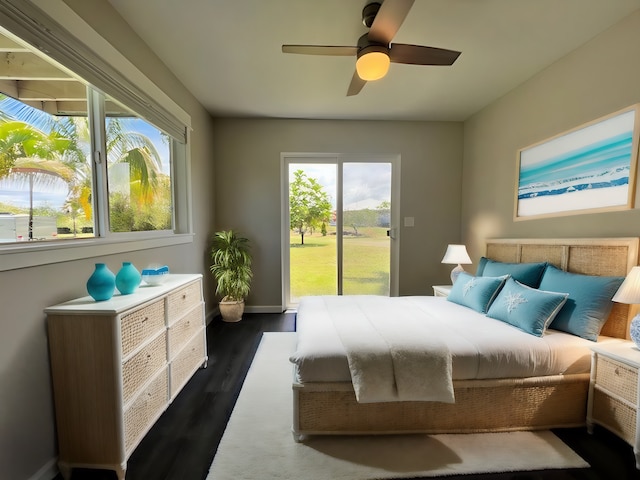 bedroom featuring dark wood-type flooring, ceiling fan, and access to exterior