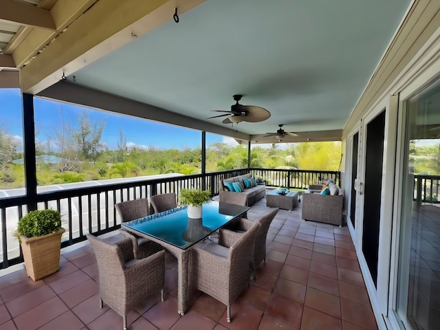 view of patio / terrace with ceiling fan and outdoor lounge area