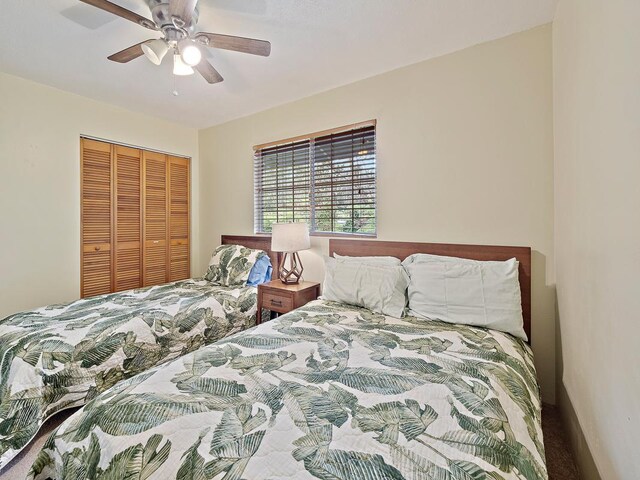 laundry room with electric panel, washer and clothes dryer, cabinets, and a textured ceiling