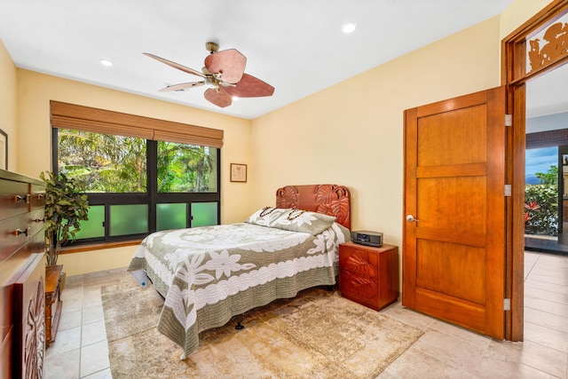 bedroom featuring ceiling fan and light tile patterned floors