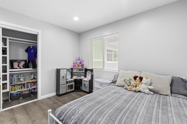 bedroom featuring dark wood-type flooring