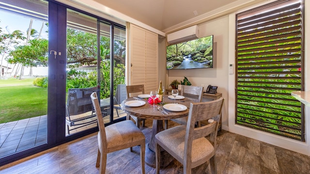 sunroom featuring a wall unit AC