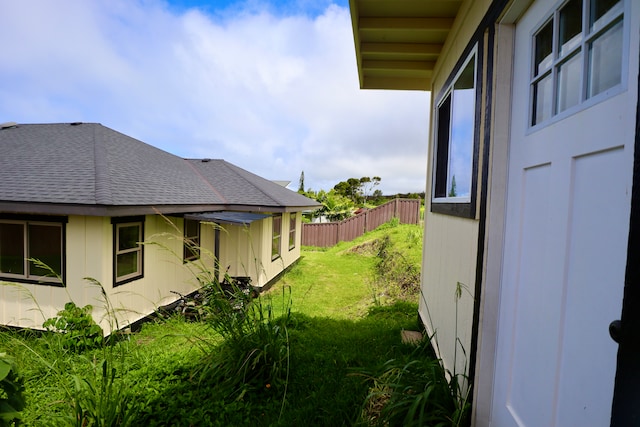 view of home's exterior featuring a lawn