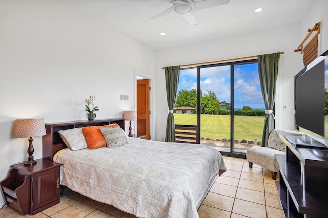 tiled bedroom featuring ceiling fan and access to outside