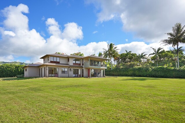 view of yard with a sunroom