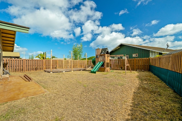 view of play area featuring a lawn