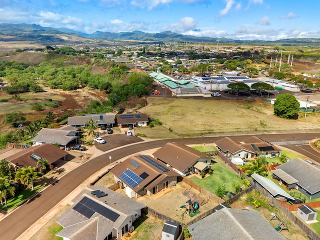 birds eye view of property with a mountain view