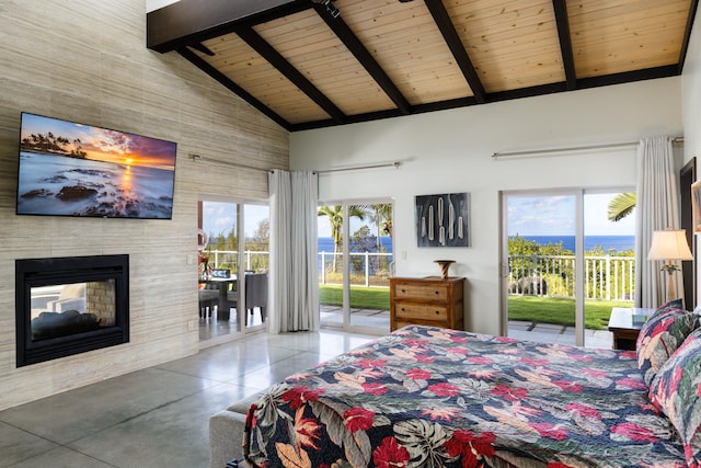 bedroom with a water view, a multi sided fireplace, beam ceiling, and access to outside