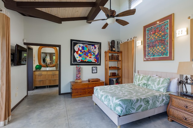 bedroom with beamed ceiling, concrete floors, and ceiling fan