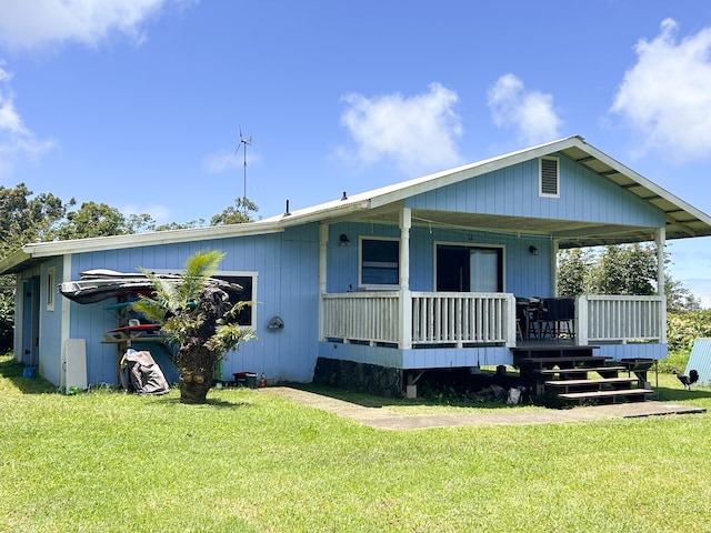 view of front of home featuring a porch and a front yard