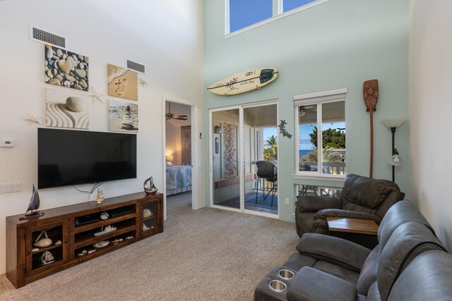 bedroom featuring carpet, ceiling fan, and vaulted ceiling