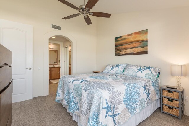 bedroom featuring light colored carpet and ceiling fan