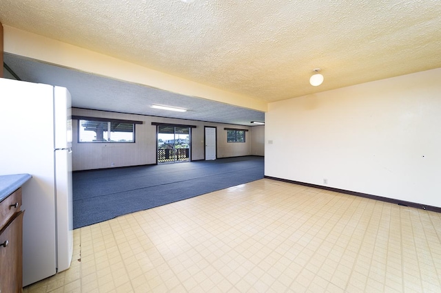 interior space with a textured ceiling