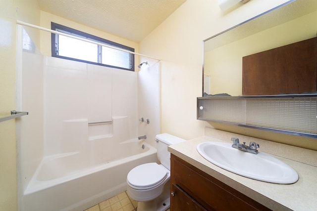 full bathroom featuring vanity, toilet, washtub / shower combination, and a textured ceiling