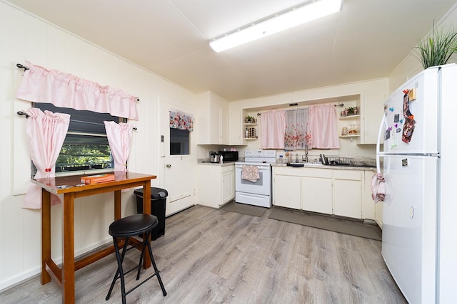 kitchen with sink, white cabinets, white appliances, and light wood-type flooring