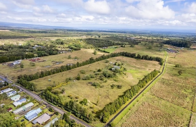 birds eye view of property featuring a rural view