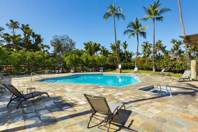 view of swimming pool featuring a patio