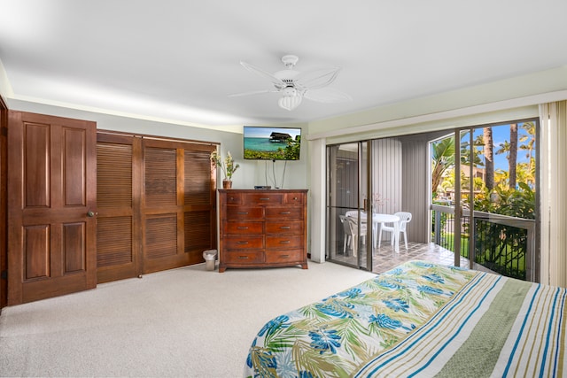 carpeted bedroom featuring access to outside and ceiling fan