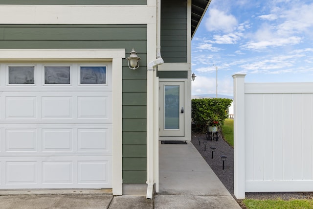 exterior space with a garage