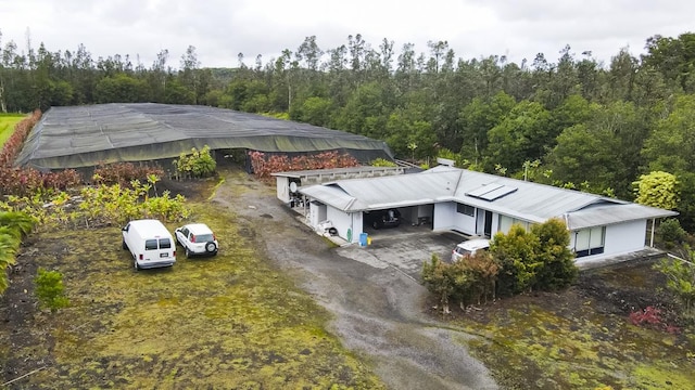 aerial view with a wooded view