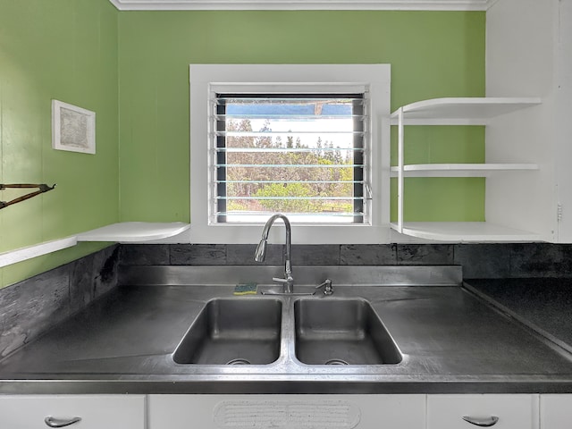 room details with sink and white cabinets