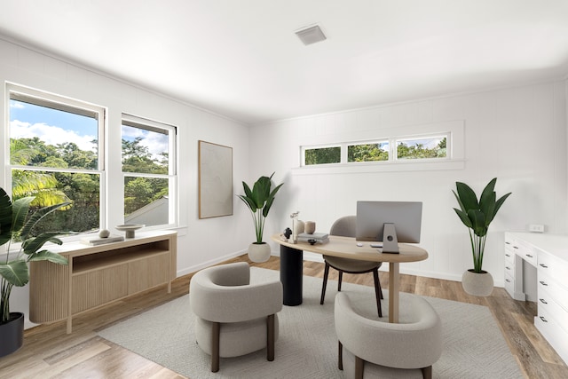 home office with light wood-type flooring