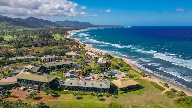 aerial view with a view of the beach and a water and mountain view