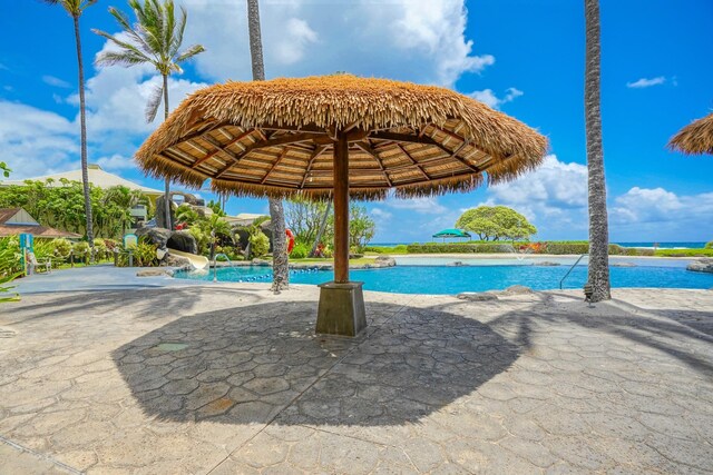 view of swimming pool with a patio area and a gazebo