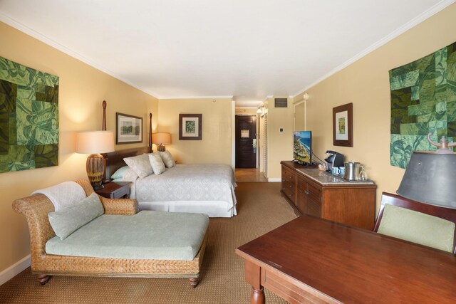 bedroom with carpet floors and ornamental molding