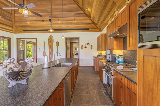 kitchen with wooden ceiling, under cabinet range hood, a sink, appliances with stainless steel finishes, and brown cabinets