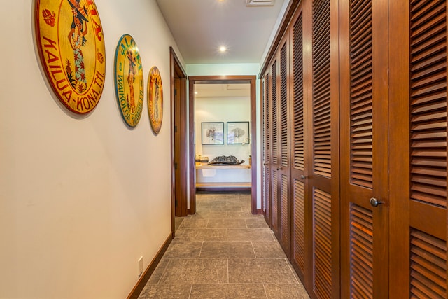 corridor featuring tile patterned floors