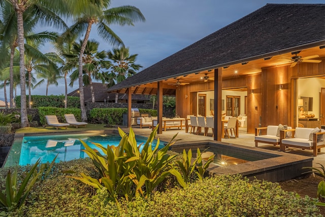 view of pool with a grill, a patio area, an outdoor living space, and ceiling fan