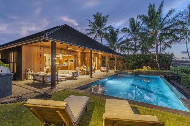 view of pool with a fenced in pool, a patio area, and outdoor lounge area