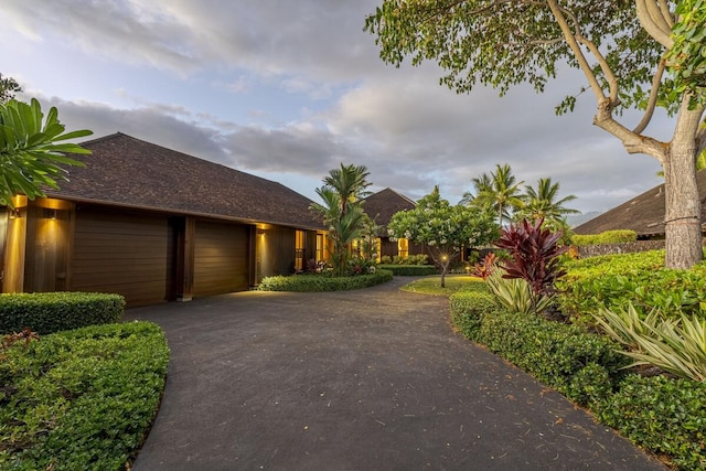 view of front of property featuring a garage and driveway