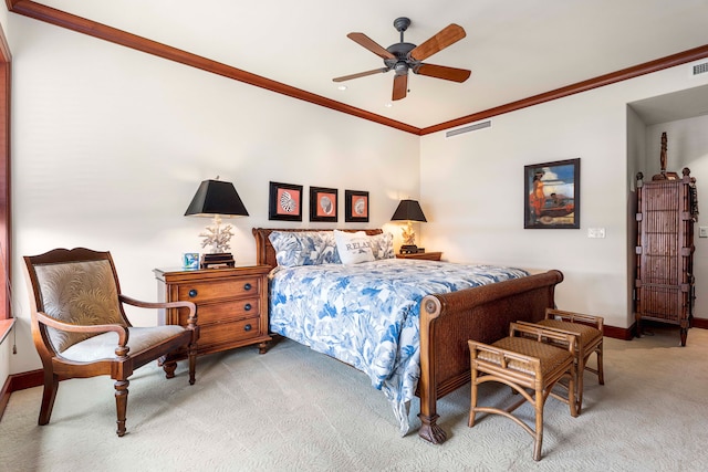 bedroom featuring crown molding, carpet floors, and ceiling fan