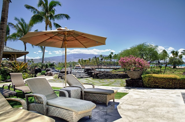 view of patio / terrace with a mountain view