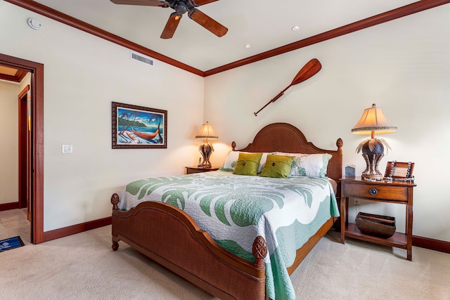 carpeted bedroom featuring crown molding and ceiling fan