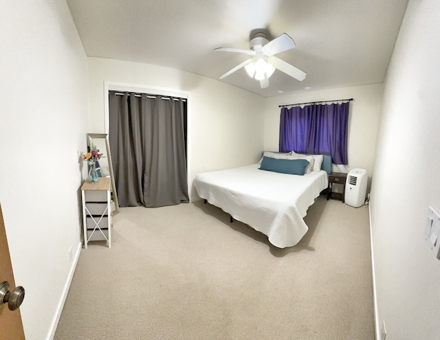 bedroom featuring carpet floors and ceiling fan