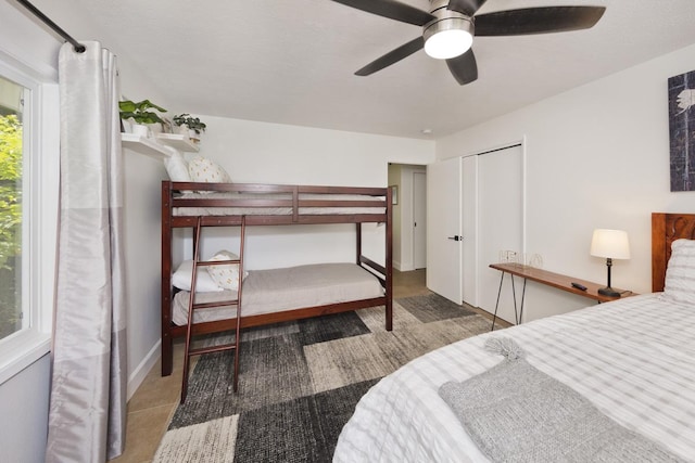 bedroom featuring a closet and ceiling fan